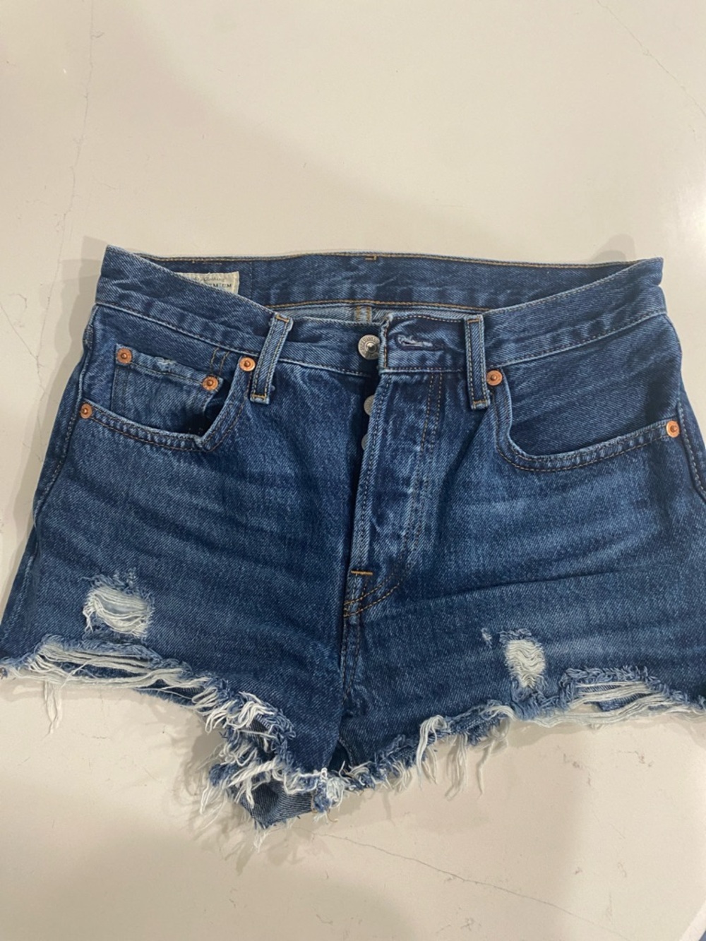 Levi's Distressed Dark Blue Denim Cutoff Shorts